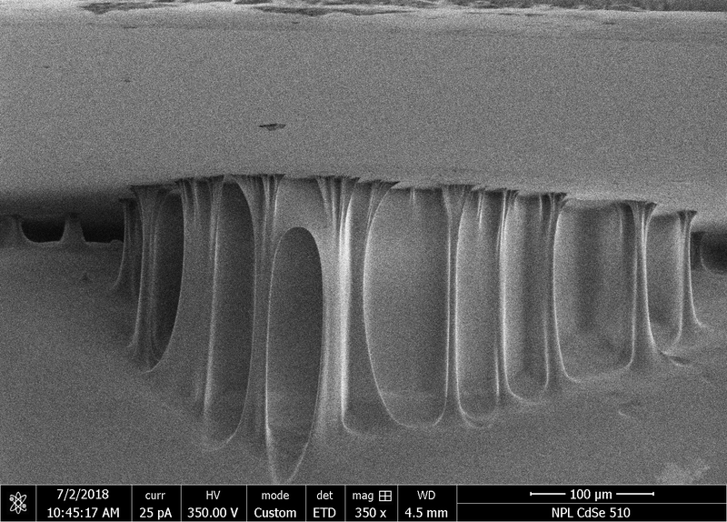 Fibers forming in debonding tape.